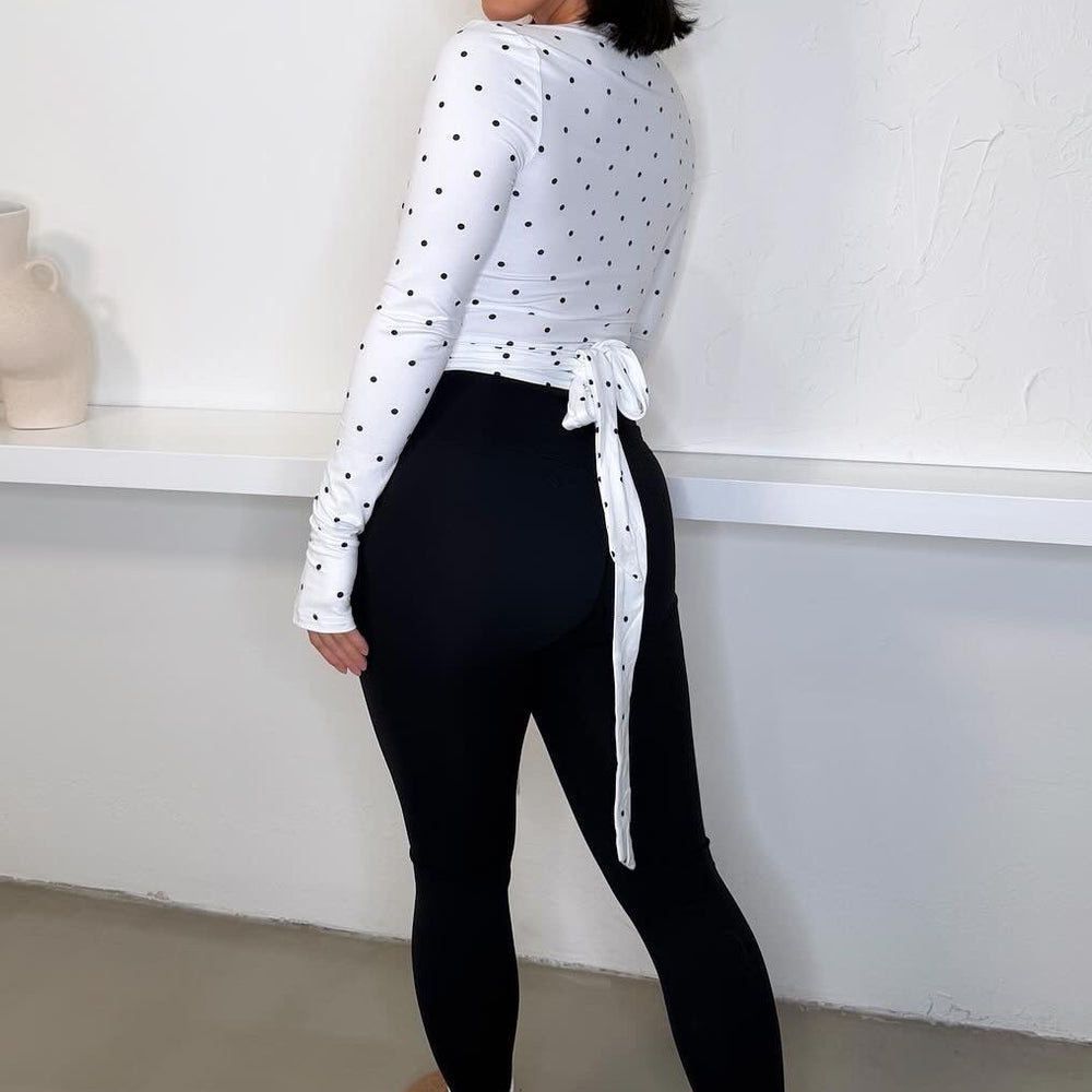 
                      
                        Sophia Wrap Top - Polka Dot
                      
                    
